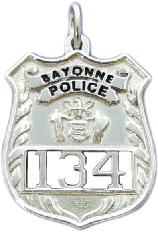 sterling silver custom 3D mini-badge jewelry pendant; design of Bayonne NJ Police Officer, black text, cut out numbers; also available as lapel pin, charm, tie tac, cuff links