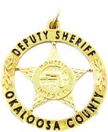 Gold plated sterling silver custom mini-badge jewelry pendant; five point star with circle design of Okaloosa County Sheriff Deputy badge; also available as mini-badge tie tac, lapel pin, cuff links