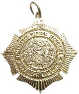 14k yellow gold custom mini-badge pendant jewelry in the design of the New York City Fire Department Emergency Medical Technician badge; also available in 14k white gold or sterling silver