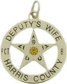 14k yellow gold custom mini-badge jewelry pendant with yellow center stone; five point 5 point star badge design of Harris County Precinct 8; also available as mini-badge jewelry tie tac, lapel pin, cuff links