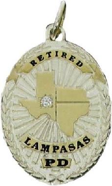two tone gold plated sterling silver custom mini-badge jewelry pendant with round brilliant diamond set in Texas shaped raised design; oval shaped badge design of Lampasas Police Department; also available as mini-badge tie tac, lapel pin, cuff links