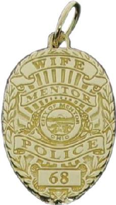 14k yellow gold custom mini-badge jewelry pendant; oval shaped badge design of Mentor Police Department; available as tie tac, lapel pin, or cuff links