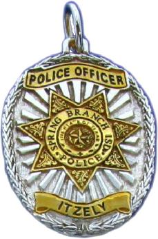 custom mini-badge jewelry pendant; oval shaped badge design of Spring Brand ISD Police Department, available in sterling silver, 10k or 14k yellow or white gold