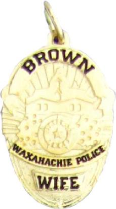 14k yellow gold mini-badge jewelry pendant; oval shaped badge of Waxahachie Police Department; also available as mini-badge tie tac, lapel pin, cuff links