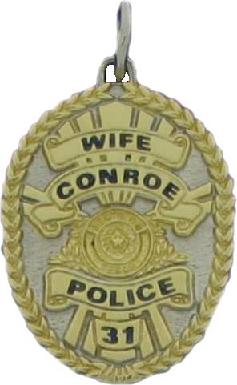 two tone sterling silver with gold plated ribbons and seal custom mini-badge jewelry pendant; oval shaped badge design of Conroe Police Department; available as tie tac, lapel pin, cuff links