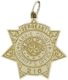 14k yellow gold custom mini-badge jewelry pendant; seven point 7 point 7 pt star design of Harris County Sheriff; also available as mini-badge tie tac, lapel pin, cuff links